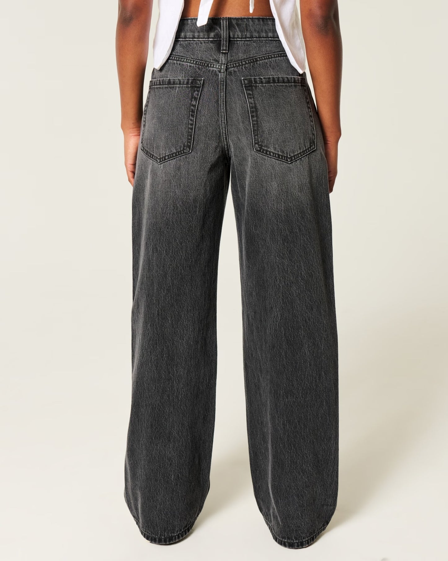 Jeans anchos de tiro alto con lavado