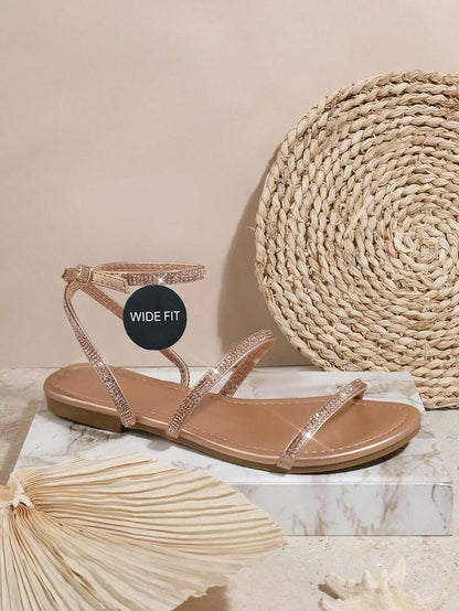 Sandalias con tira cruzada brillante
