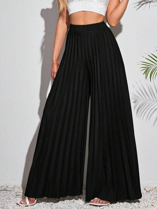 Pantalones extra largos de pierna ancha y pliegues
