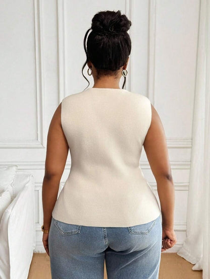 Blusa de punto con botones dorados