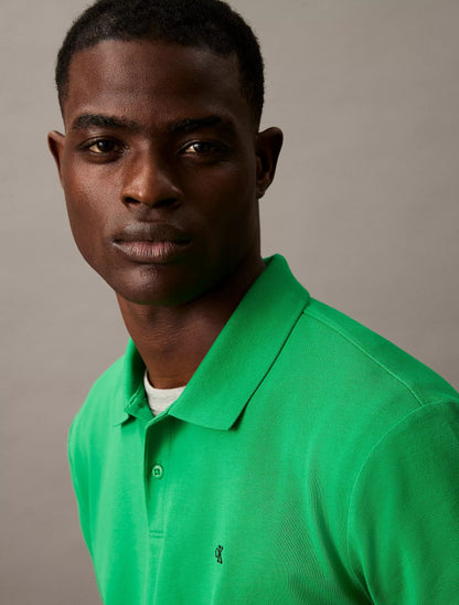Chemise unicolor con logo