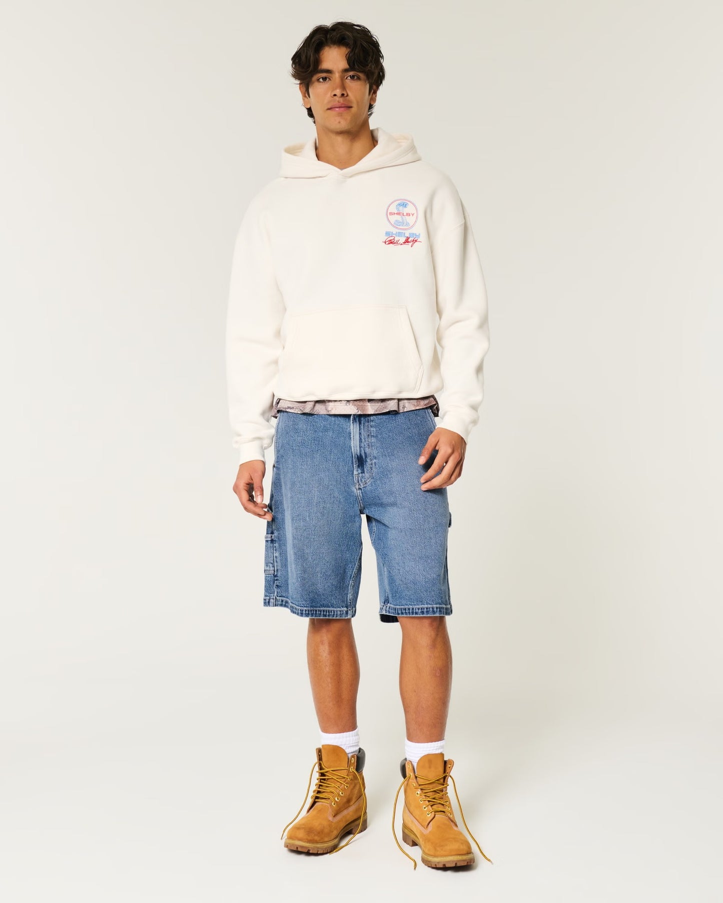 Bermuda denim con lavado medio y corte holgado