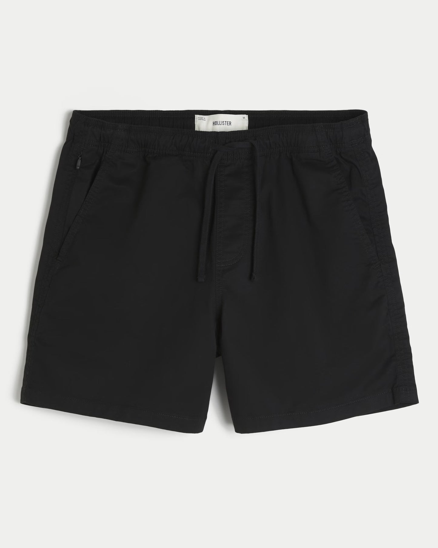 Shorts de sarga a medio muslo unicolor