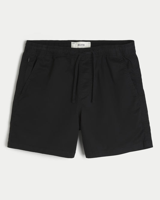 Shorts de sarga a medio muslo unicolor