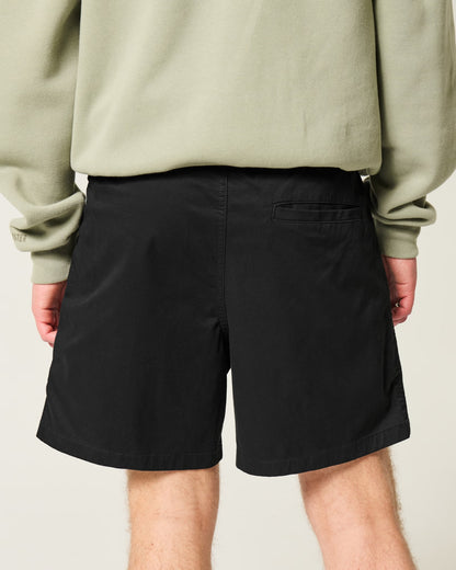 Shorts de sarga a medio muslo unicolor